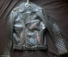 Dynamic Black Cowhide Leather Biker Jacket Punk Rock Style with Silver Studs & Red-Toned Zippered Pockets